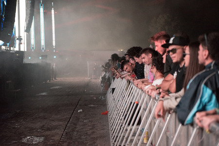 BONTIDA, ROMANIA - JULY 21,  2018: Crowd of partying people dancing during a Dj Excision live set at Electric Castle festivalのeditorial素材