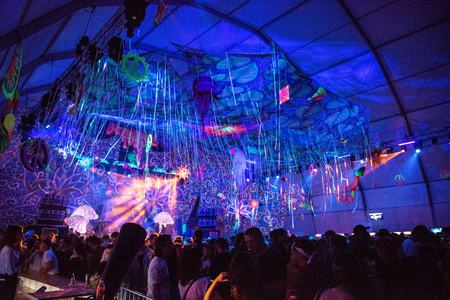 BONTIDA, ROMANIA - JULY 19, 2018: People clubbing at the Elrow, the biggest party concept in the Wolrd at Electric Castle festivalのeditorial素材