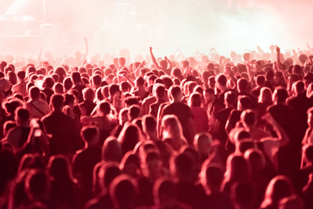 BONTIDA, ROMANIA - JULY 21,  2018: Crowd of partying people dancing during a Dj Excision live set at Electric Castle festivalのeditorial素材