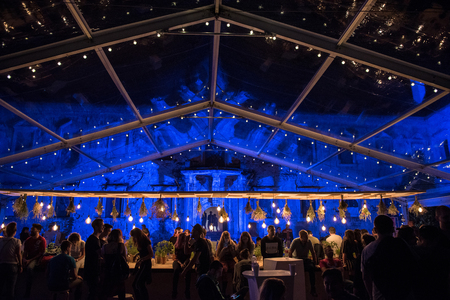 BONTIDA, ROMANIA - JULY 20, 2018: People enjoying the night at Electric Castle festivalのeditorial素材