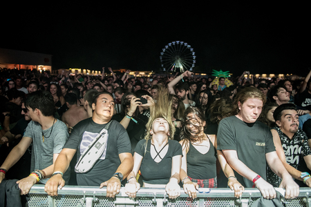 BONTIDA, ROMANIA - JULY 21,  2018: Crowd of partying people headbanging during a Dj Excision live set at Electric Castle festivalのeditorial素材