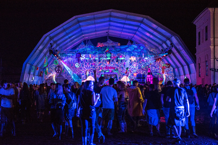 BONTIDA, ROMANIA - JULY 19, 2018: People clubbing at the Elrow, the biggest party concept in the Wolrd at Electric Castle festivalのeditorial素材