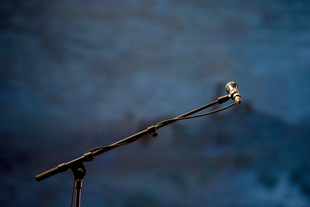 Microphone on stand on the stage at concertの写真素材