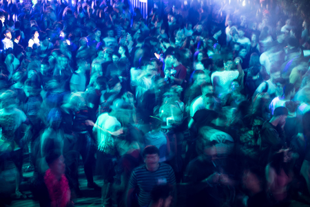 BONTIDA, ROMANIA - JULY 20, 2018: Crowd partying at Electrical Castle music festival. Long exposure, motion blur on peopleのeditorial素材