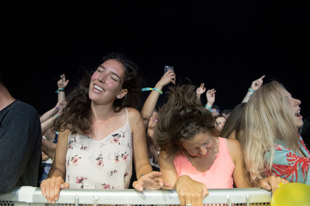 BONTIDA, ROMANIA - JULY 21, 2018: Crowd of partying people enjoying a The Bloody Beetroots live concert at Electric Castle festivalのeditorial素材