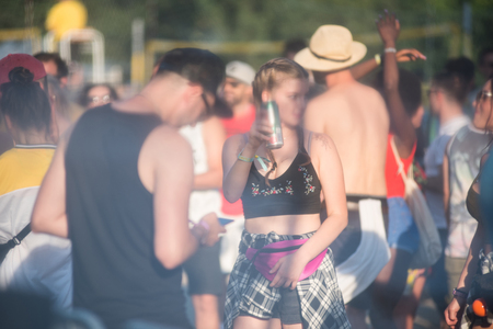 BONTIDA, ROMANIA - JULY 21, 2018: People having fun and relaxing during the day at Electric Castle festivalのeditorial素材