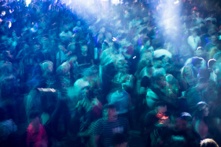 BONTIDA, ROMANIA - JULY 20, 2018: Crowd partying at Electrical Castle music festival. Long exposure, motion blur on peopleのeditorial素材