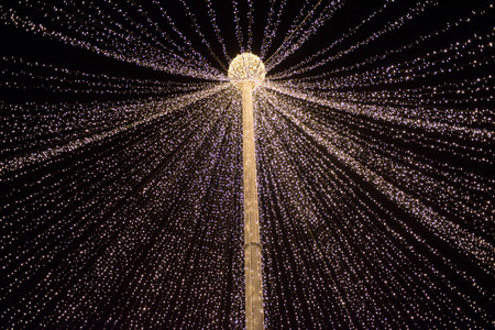 Background of Christmas lights in the cityの写真素材