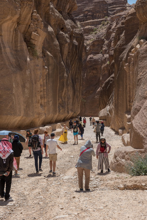 PETRA, JORDAN - MAY 17, 2018: Tourists visiting the Unesco heritage site of Petra, one of the New Seven Wonders of the Worldのeditorial素材