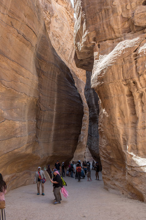 PETRA, JORDAN - MAY 17, 2018: Tourists visiting the Unesco heritage site of Petra, one of the New Seven Wonders of the Worldのeditorial素材