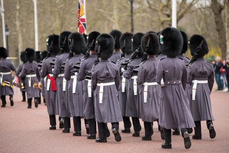 LONDON, UK - MARCH 22, 2019: The Royal Guards marching during the parade at the Changing of the...