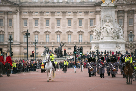 LONDON, UK - MARCH 22, 2019: The Royal Guards marching during the parade at the Changing of the Guard ceremony across Buckingham Palaceのeditorial素材