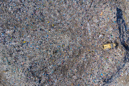 Aerial top drone view of large garbage pile, trash dump, landfill, waste from household dumping...