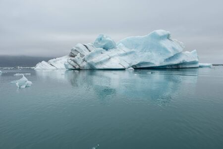 Melting icebergs as a result of global warming and climate change floating in Jokulsarlon glacial lagoon. Vatnajokull National Park, Icelandの写真素材
