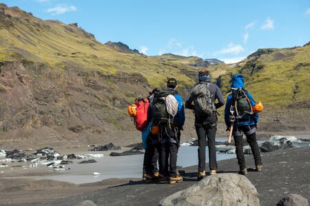 SOLHEIMAJOKULL, iCELAND - MAY 21, 2019: Tourists making a glacier hiking with a private tour guide in the Solheimajokull, Icelandのeditorial素材
