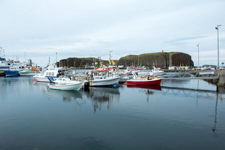 STYKKISHOLMUR, ICELAND - MAY 19, 2019:  Stykkisholmur is a harbor town situated in the western part of Iceland and is visited every summer by crowd of touristsのeditorial素材