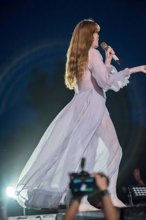 BONTIDA, ROMANIA - JULY 19, 2019: Singer of Florence and the Machine English indie rock band singing live on the stage during a concert at Electric Castle festivalのeditorial素材