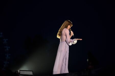 BONTIDA, ROMANIA - JULY 19, 2019: Singer of Florence and the Machine English indie rock band singing live on the stage during a concert at Electric Castle festivalのeditorial素材