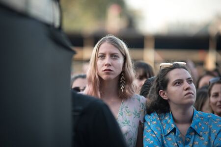 BONTIDA, ROMANIA - JULY 19, 2019: Cheerful people partying during a The Vaccines live concert at Electric Castle Festivalのeditorial素材