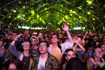 BONTIDA, ROMANIA - JULY 19, 2019: Crowd of cheerful people dancing and partying during a Sofi Tukker concert at Electric Castle festivalのeditorial素材