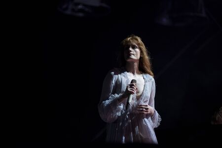 BONTIDA, ROMANIA - JULY 19, 2019: Singer of Florence and the Machine English indie rock band singing live on the stage during a concert at Electric Castle festivalのeditorial素材
