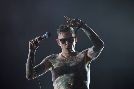 BONTIDA, ROMANIA - JULY 21, 2019: Swedish post-punk band Viagra Boys performing a live concert at Electric Castle festivalのeditorial素材