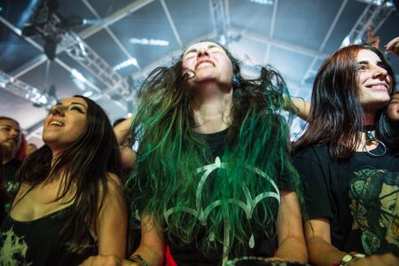 BONTIDA, ROMANIA - JULY 20, 2019: Crowd of people headbanging and partying during a While She Sleeps...