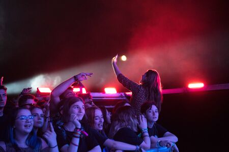 BONTIDA, ROMANIA - JULY 20, 2019: Crowd of young people partying during a Subcarpati live concert at Electric Castle festivalのeditorial素材