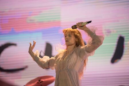 BONTIDA, ROMANIA - JULY 19, 2019: Singer of Florence and the Machine English indie rock band singing live on the stage during a concert at Electric Castle festivalのeditorial素材