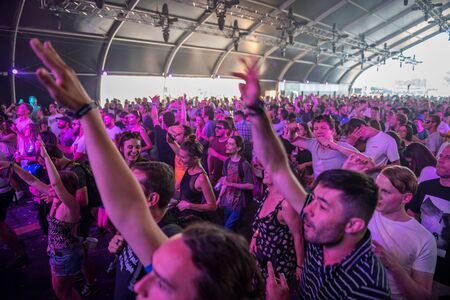 BONTIDA, ROMANIA - JULY 19, 2019: Crowd of people dancing at a Pannonia Allstars Ska Orchestra (PASO) live concert at Electric Castle festivalのeditorial素材
