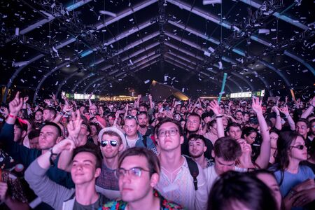 BONTIDA, ROMANIA - JULY 19, 2019: Crowd of cheerful people dancing and partying during a Sofi Tukker concert at Electric Castle festivalのeditorial素材