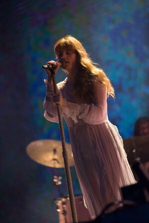 BONTIDA, ROMANIA - JULY 19, 2019: Singer of Florence and the Machine English indie rock band singing live on the stage during a concert at Electric Castle festivalのeditorial素材