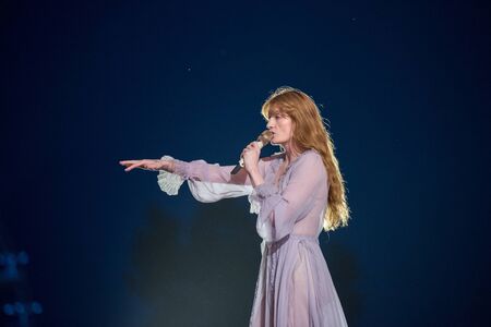 BONTIDA, ROMANIA - JULY 19, 2019: Singer of Florence and the Machine English indie rock band singing live on the stage during a concert at Electric Castle festivalのeditorial素材