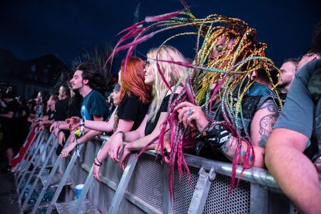 SIBIU, ROMANIA - JULY 26, 2019: Crowd of people headbanging and partying during an Architects rock concert at Artmania Festivalのeditorial素材