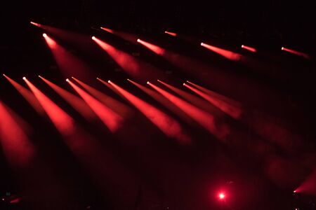 Red stage lights at music festivalの写真素材