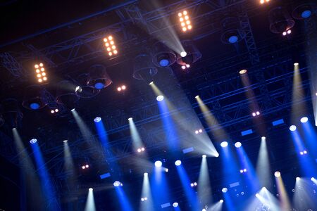 Blue stage lights at music festival