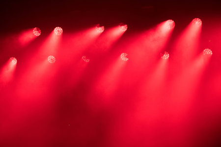 Red stage lights at music festivalの写真素材