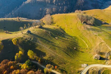 Aerial drone shot over autumn scenery in Transylvania, Romaniaの写真素材