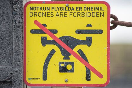 DYRHOLAEY, ICELAND - MAY 21, 2019: Drones are forbidden, no fly zone sign warning the tourists to not fly with a quadcopter because of the nesting birdsのeditorial素材