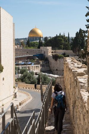 JERUSALEM, ISRAEL - MAY 16, 2018: Tourist woman visiting the Old City of Jerusalem