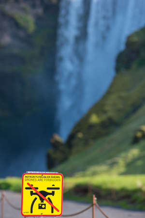 SKOGAFOSS, ICELAND - MAY 24, 2019: Drones are forbidden, no fly zone sign warning the tourists to not fly with a quadcopter because of the nesting birdsのeditorial素材