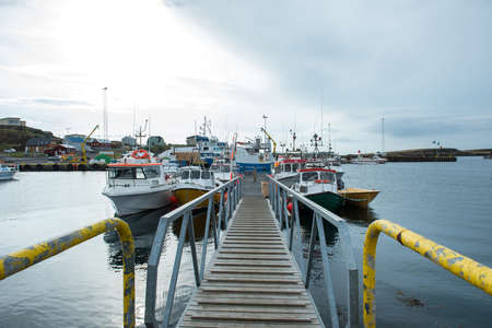 STYKKISHOLMUR, ICELAND - MAY 19, 2019:  Stykkisholmur is a harbor town situated in the western part of Iceland and is visited every summer by crowd of touristsのeditorial素材