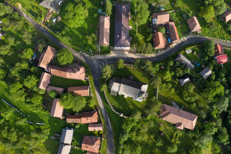 Aerial drone point of view of a whitewashed protestant church in Manastireni, Transylvania, Romaniaの写真素材