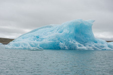 Melting icebergs as a result of global warming and climate change floating in Jokulsarlon glacial lagoon. Vatnajokull National Park, Icelandの写真素材
