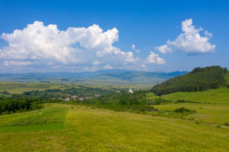 Aerial drone view of a countryside small village. Valeni (Magyarvalko), Transylvania, Romania