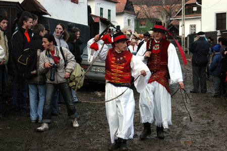 RIMETEA - FEBRUARY 28, 2004: Unidentified villagers of Rimetea,Torocko attending a unique show, the celebration and carnival at the end of winterのeditorial素材