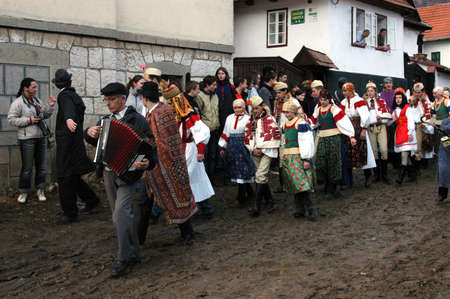 RIMETEA - FEBRUARY 28, 2004: Unidentified villagers of Rimetea,Torocko attending a unique show, the celebration and carnival at the end of winterのeditorial素材