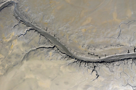 Aerial view of abstract muddy background. Decanting pond, copper mining residuals