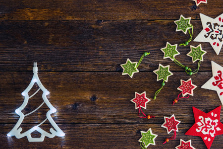 Collection of Christmas objects, ornaments, gifts and presents on wooden vintage backgroundの写真素材