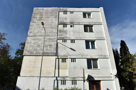 Typical facade of concrete panel building. Post Soviet flat of blocksの写真素材